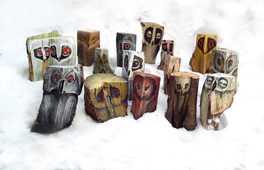 Owls On Wooden Logs