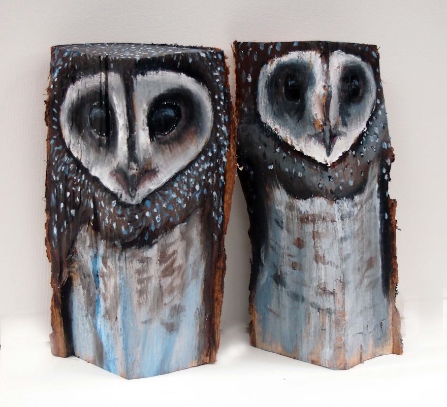 Owls On Wooden Logs