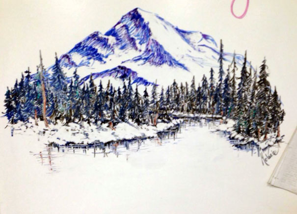 Teacher Draws Mountains On Her Whiteboard