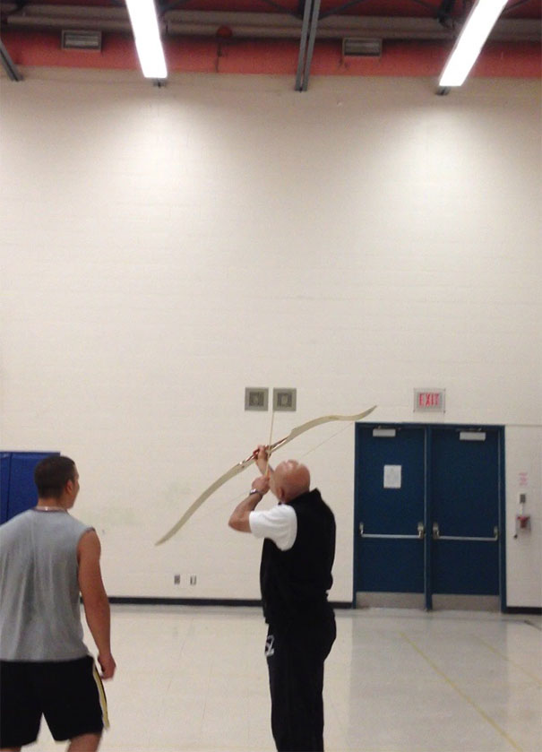 Gym Teacher Tries To Get Down A Ball His Students Got Stuck In The Rafters