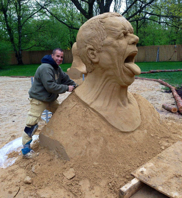 Art Teacher Sculpts Giant Sand Head