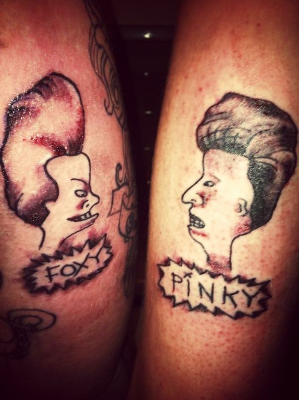 Matching couple tattoos with cartoon faces and words "Foxy" and "Pinky," symbolizing love and growing old together.