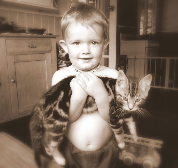 Owen And Tiger...the Day He Was Brave Enough To Pick Him Up By Himself..