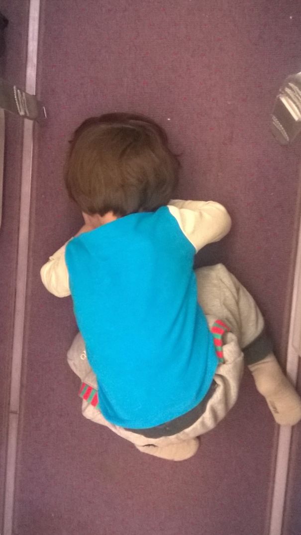 Taking A Nap On A Plane Aisle