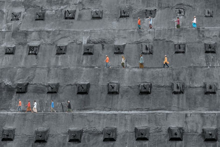Muslims Walk Along A Retaining Wall Towards A Mosque To Pray, Kuala Lumpur, Malaysia