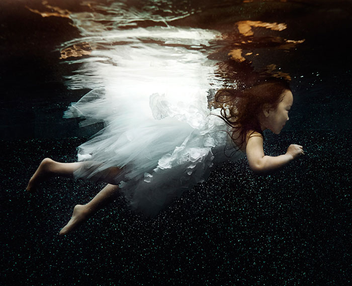 Little Underwater Dancers: Children’s Personalities Captured Through Water