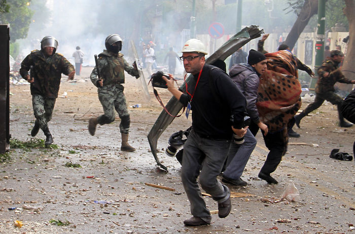 Palestinian Afp Photographer Mohammed Abed Take Picture As He Ruining During Clashes In Cairo