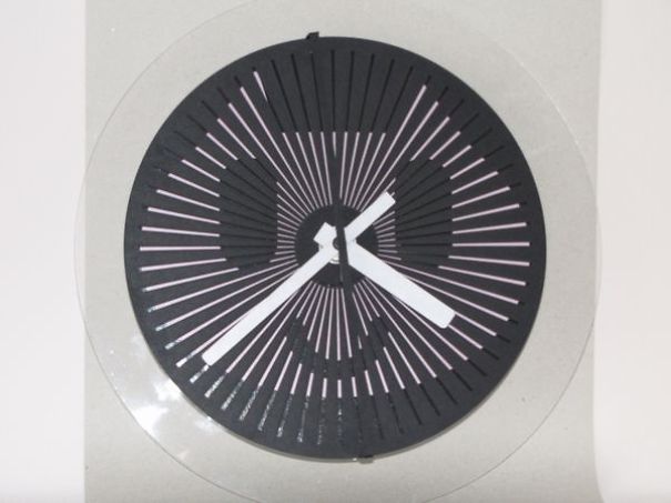 Optical Illusion Wallclocks Show Hidden Animations When Their Arrows Moves