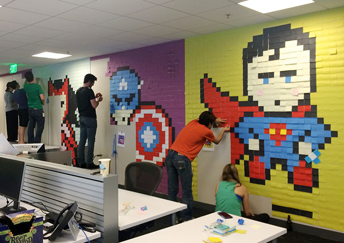 Worker Uses 8,024 Post-It Notes To Turn Boring Office Walls Into Superhero Murals