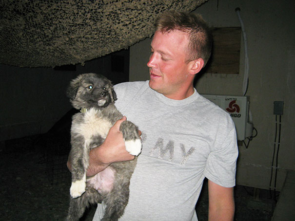 Soldier With A Puppy