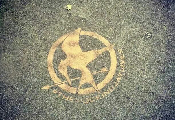 Mockingjay Sign Looks Like Johny Bravo Holding An Arrow