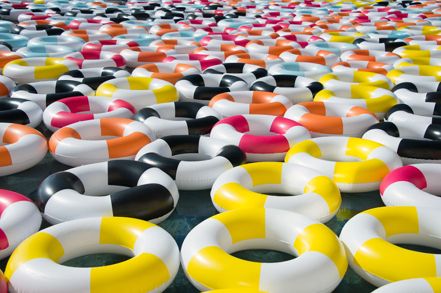 Poolside Photos With 1,000 Inner Tubes Bring Back 1960s Mediterranean Glamor Poolside Photos With 1,000 Inner Tubes Bring Back 1960s Mediterranean Glamor