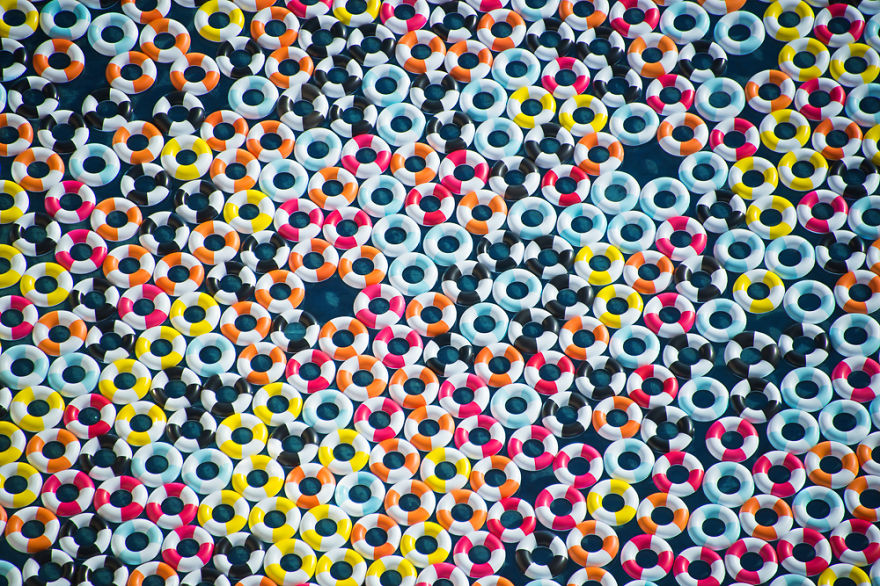 Poolside Photos With 1,000 Inner Tubes Bring Back 1960s Mediterranean Glamor Poolside Photos With 1,000 Inner Tubes Bring Back 1960s Mediterranean Glamor