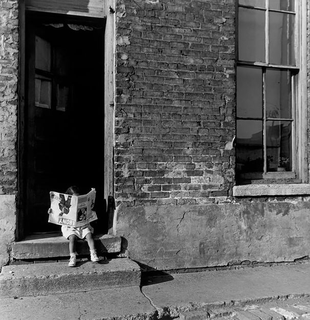 A Girl “reading” Ebony Magazine. Chicago, 1947