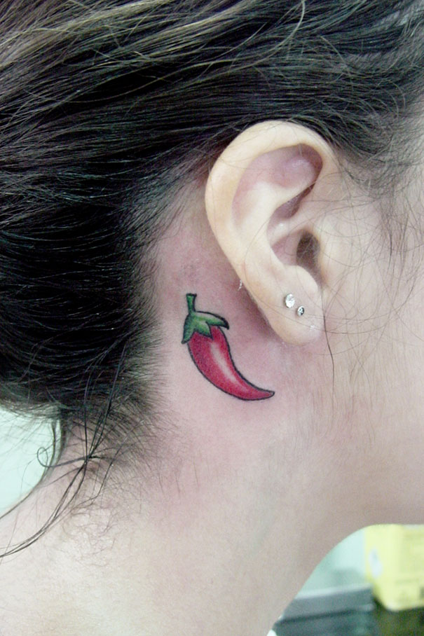 Chili pepper ear tattoo, showcasing creative ear tattoo design.