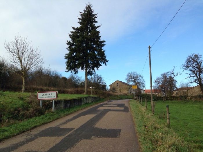 Between France And Germany - Only The Different City Limit Sign Shows The Difference.