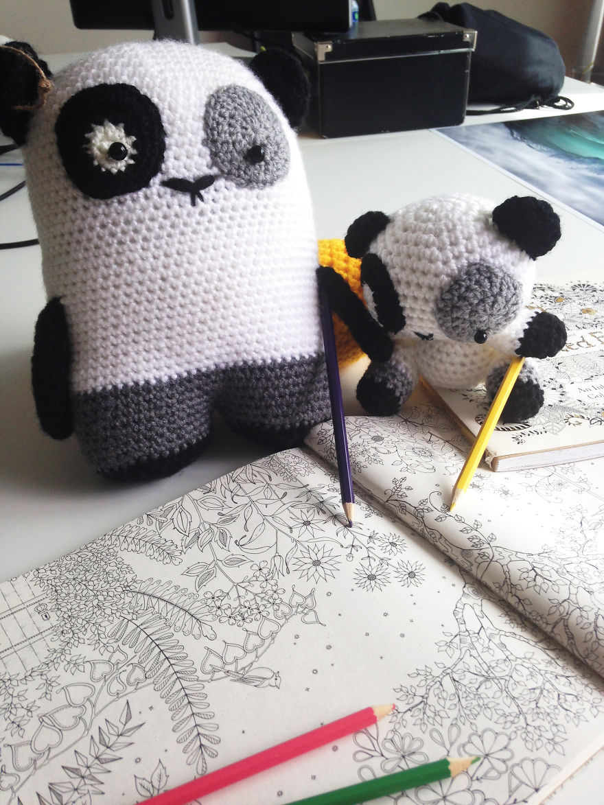 Pandas Enjoying Their Coloring Book