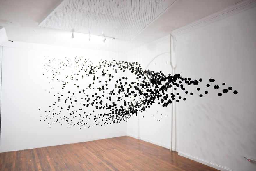 1,252 Floating Balls Form An Eye When Looking From The Right Angle