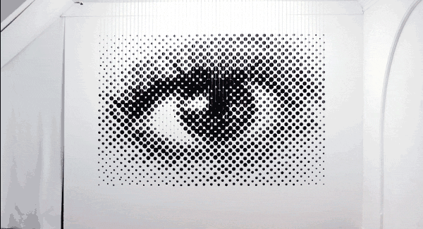 1,252 Floating Balls Form An Eye When Looking From The Right Angle
