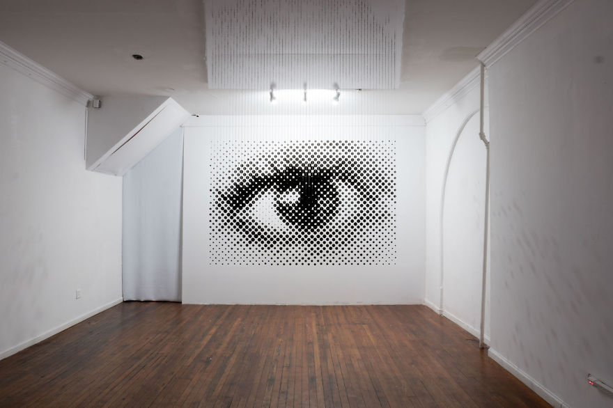 1,252 Floating Balls Form An Eye When Looking From The Right Angle 1,252 Floating Balls Form An Eye When Looking From The Right Angle
