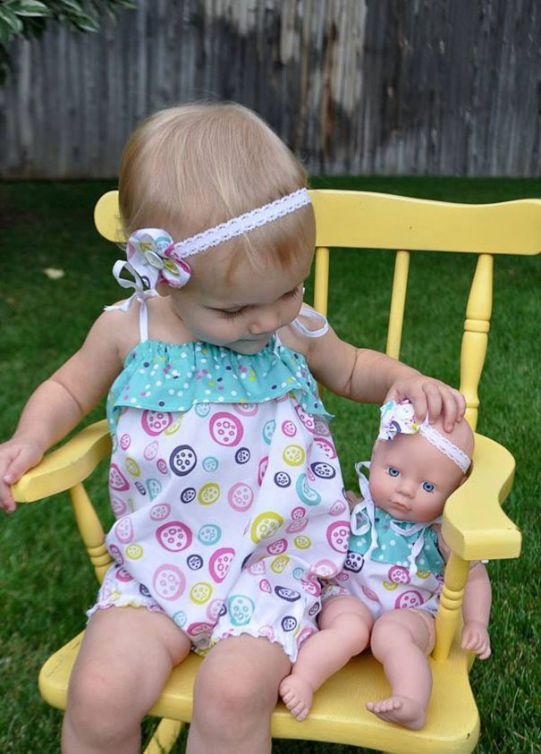Girl With Her Look Alike Doll