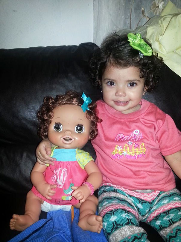 Girl With Her Look Alike Doll