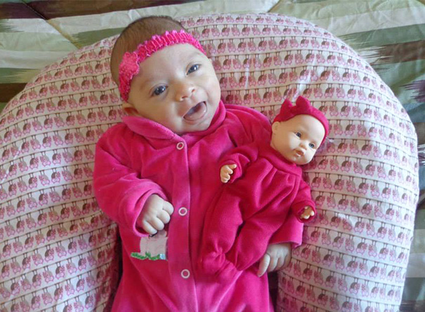 Baby Girl With Her Look Alike Doll
