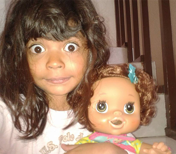 Girl With Her Look Alike Doll