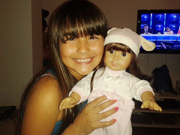 Girl With Her Look Alike Doll
