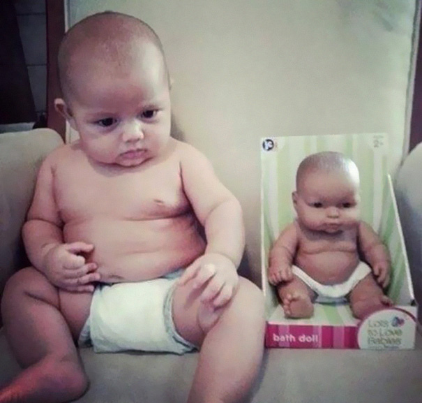 Baby With A Look Alike Doll