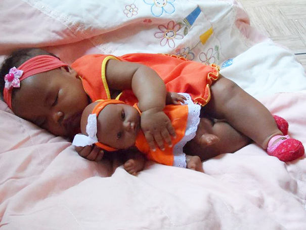 Girl With Her Look Alike Doll