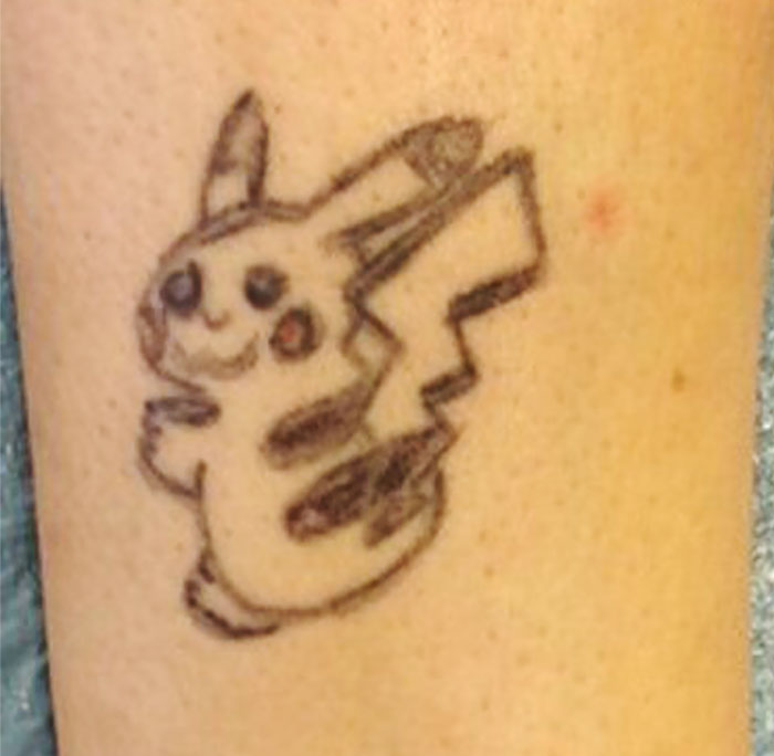 Amateur Pikachu tattoo cover-up attempt before becoming Pikasso art style. Amateur Pikachu tattoo cover-up attempt before becoming Pikasso art style.