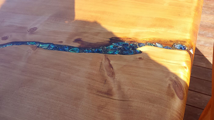 Artists Fill Tables' Cracks With Sea Shells, Stones And Starfish