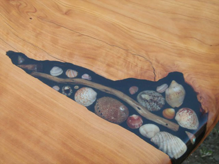 Artists Fill Tables' Cracks With Sea Shells, Stones And Starfish Artists Fill Tables' Cracks With Sea Shells, Stones And Starfish