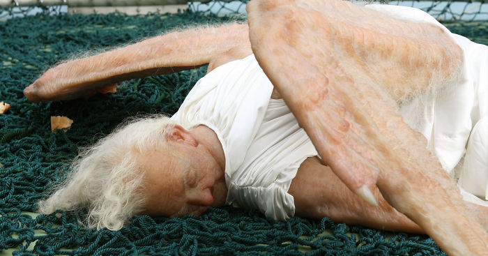 Terrifying Hyper-Realistic Sculpture Of A Fallen Angel By Chinese Artist Duo