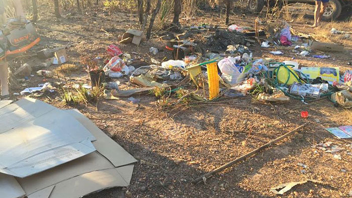 illegal-dump-garbage-front-yard-frederick-tomlinson-queensland-australia-4