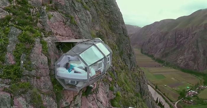 Terrifying See-Through Sleeping Capsules Hang 400 Feet Above Peru’s Sacred Valley