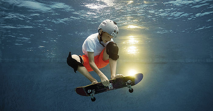 I Photograph Kids Playing Their Favorite Sports Underwater