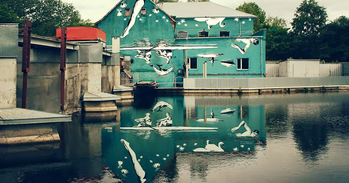 This Mural Was Painted Upside-Down To Reflect Off Of The Water