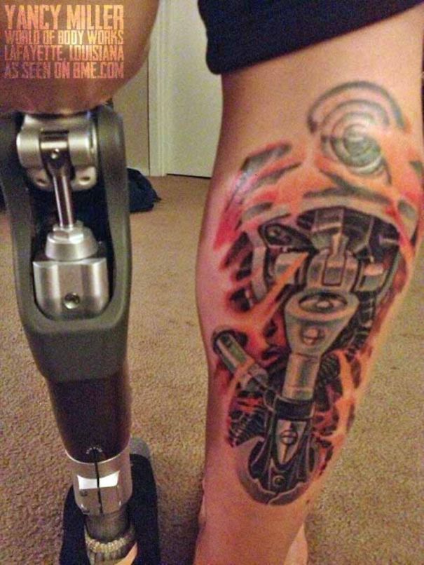 Tattoo of a Picasso-inspired abstract design on a prosthetic leg.