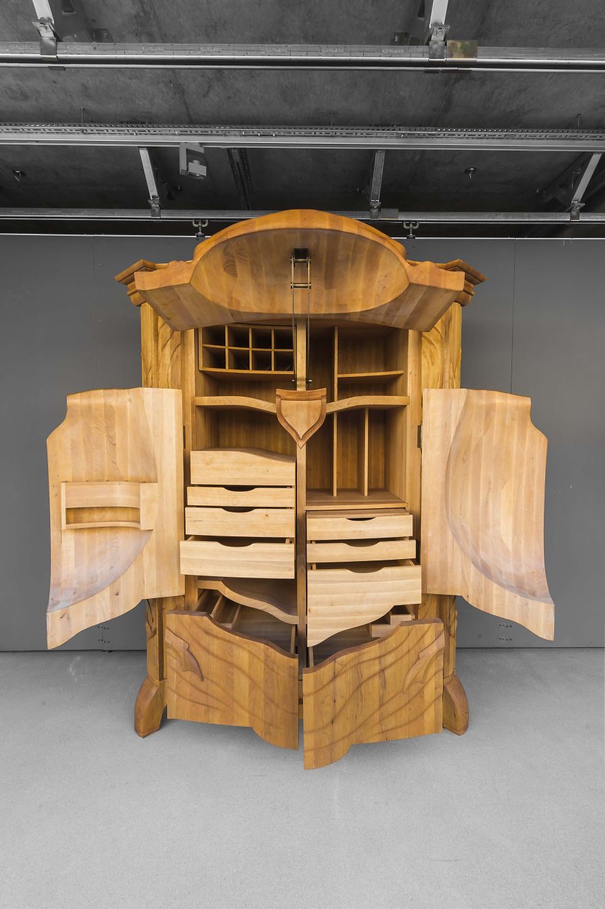 Latvian Artist Carves Wood Cabinet In Shape Of Giant Beetle