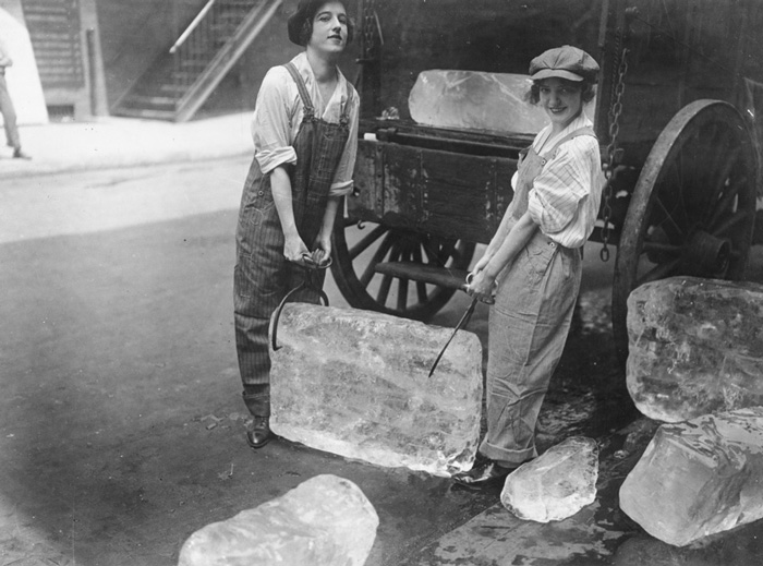 Girls Deliver Ice. Heavy Work That Formerly Belonged To Men Only Is Being Done By Girls (16 September, 1918)