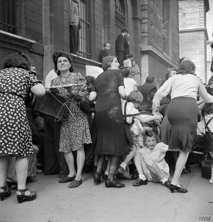 Civilians Run For Cover As German Snipers Open Fire From Buildings In Paris (26 August, 1944)