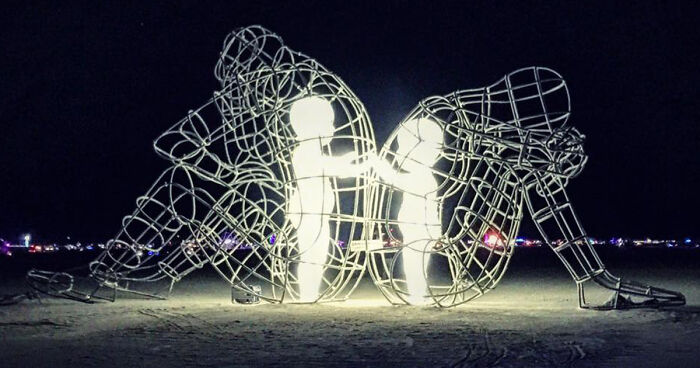 Powerful Sculpture At Burning Man Shows Inner Children Trapped Inside Adult Bodies