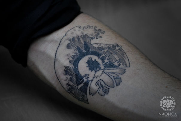 Studio Ghibli tattoo with intricate design inspired by Miyazaki films on forearm.