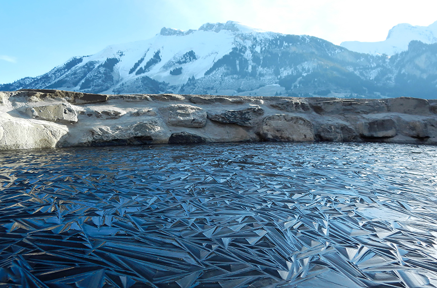 Frozen Pond In Switzerland