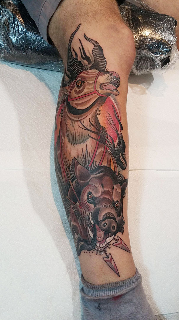 Studio Ghibli tattoo featuring a boar from Miyazaki films on a person's calf.