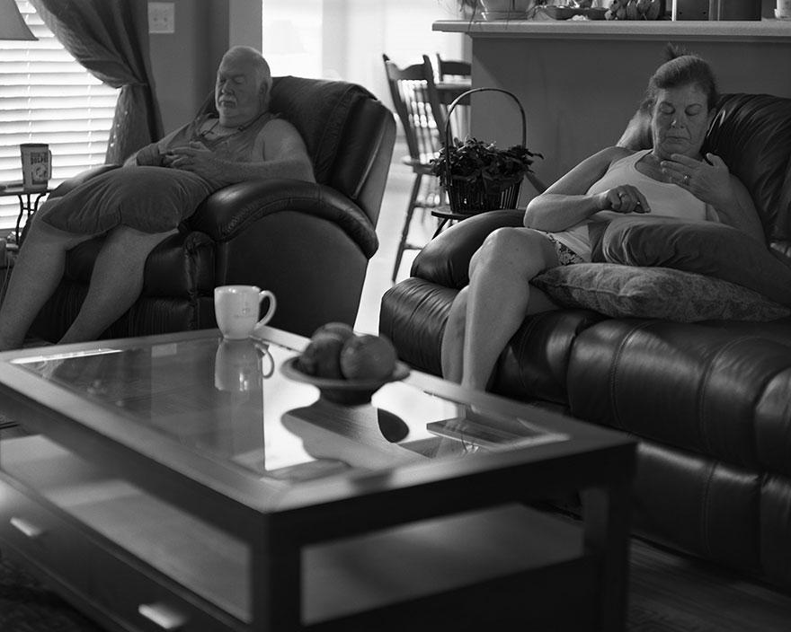 Black and white portrait of a man and woman removed phones, highlighting addiction in modern life by photographer Eric Pickersgill. Black and white portrait of a man and woman removed phones, highlighting addiction in modern life by photographer Eric Pickersgill.