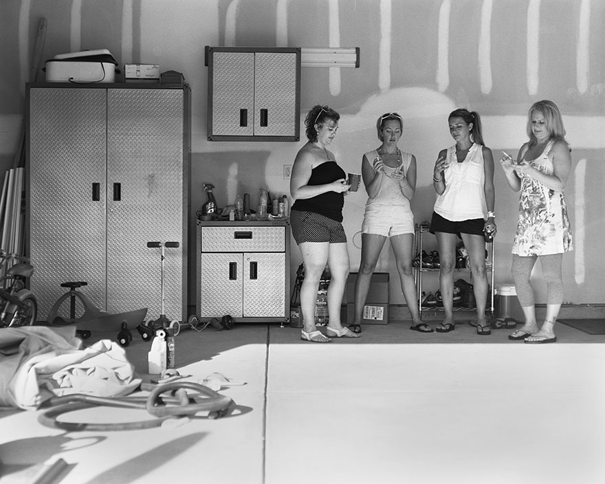 Four women photographed without phones in their hands, illustrating phone addiction removed by the photographer. Four women photographed without phones in their hands, illustrating phone addiction removed by the photographer.