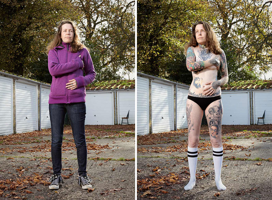 Tattooed person in casual clothes, revealing tattoos underneath, captured in a garage setting by photographer. Tattooed person in casual clothes, revealing tattoos underneath, captured in a garage setting by photographer.